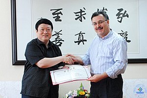 Dr.Muammer koc��ƸΪ���ϴ�ѧ��������