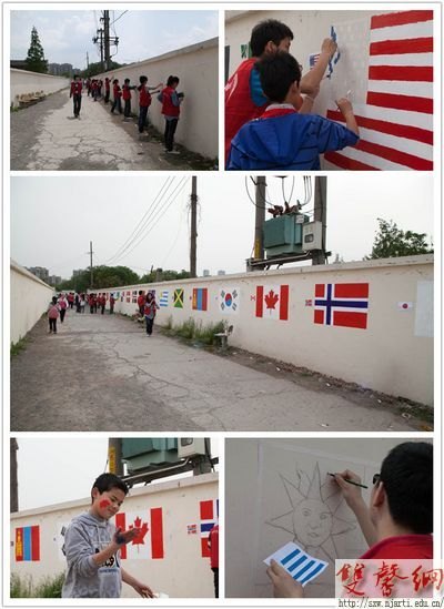 传媒志愿者为民工小学校墙绘制180米“青奥外衣”