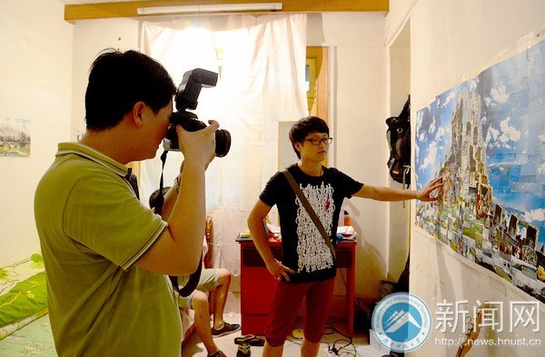 人民日报记者来湖南科技大学采访“大学生自强之星”赖庆林