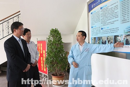 恩施州副州长檀坤华一行来湖北民族学院检查指导科研工作