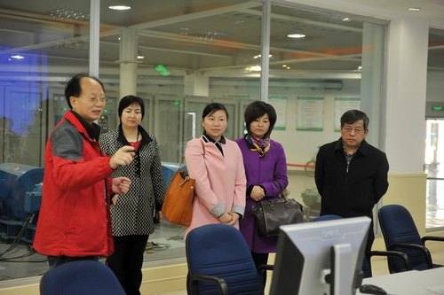 奉贤区四团镇及五四村领导一行来校开展共建活动